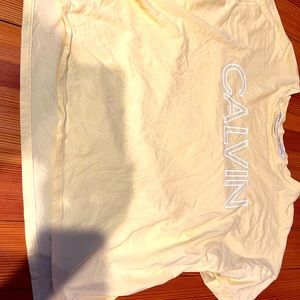 Yellow Calvin tee.